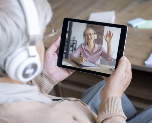 Senior talking over video call